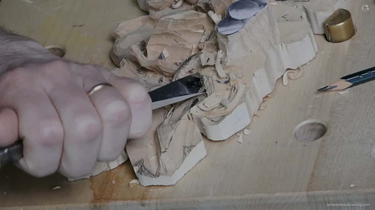 Fist around a larger skew, chopping waste off the side