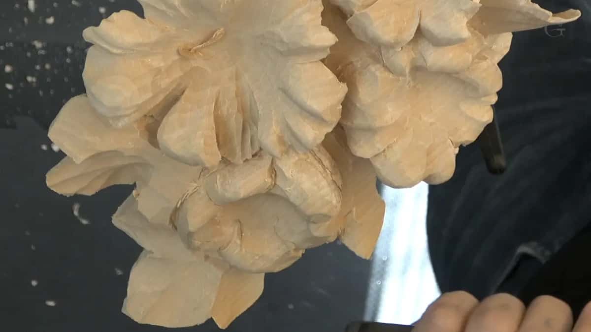 Shaving material off a lump that is going to be a leaf.