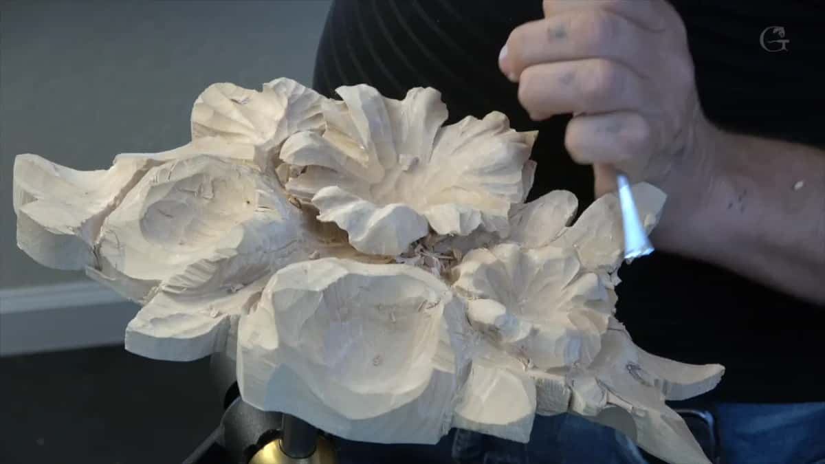 The panel turned on its side so the hollows between the petals show.