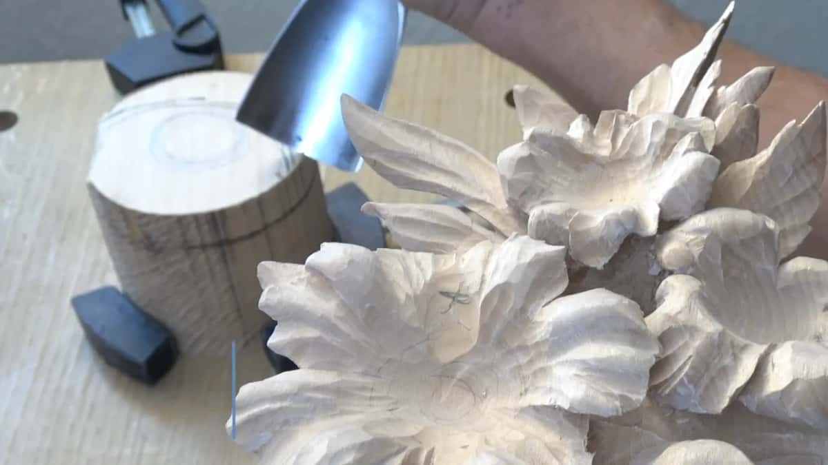 A gouge roughly three inches wide, which is the fastest way to move that much wood.