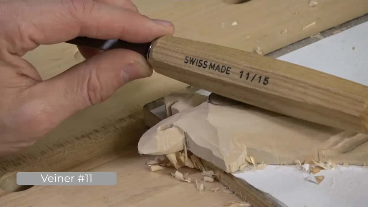Swiss made, 11 by 15, stamped along the handle of the veiner.