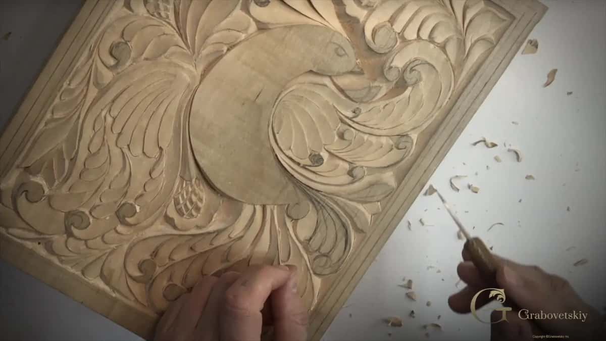 Going deeper around the bird so its outline stands above the design around it.