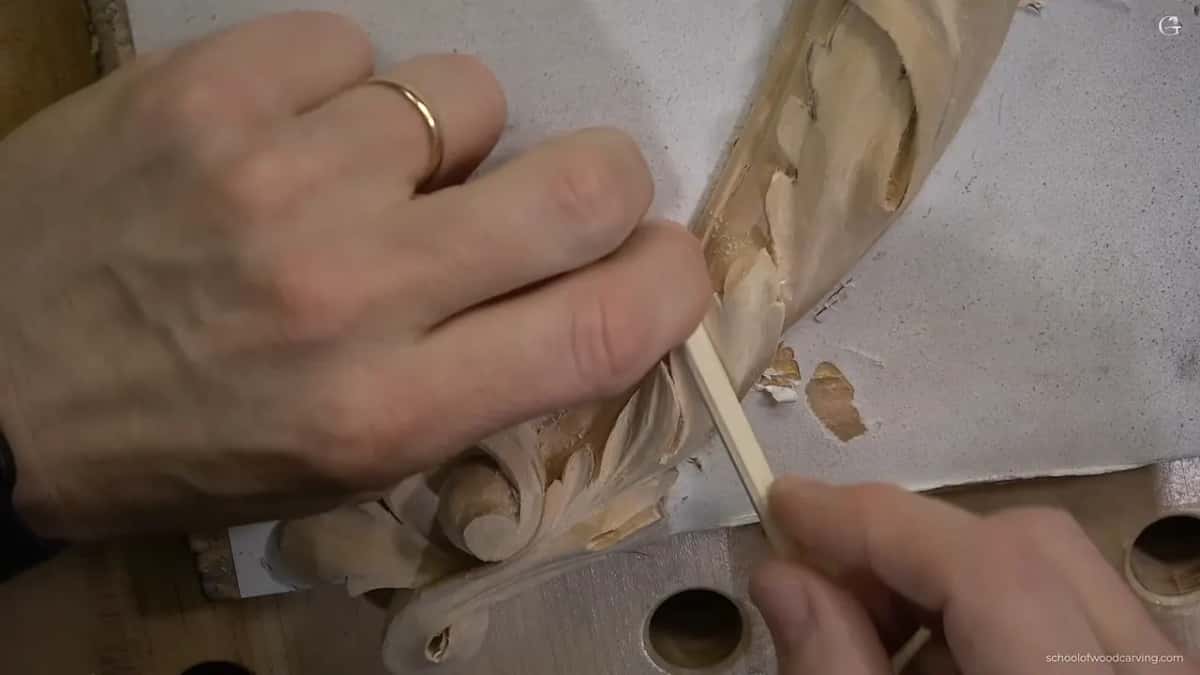A wood scrap burnishing the surface.