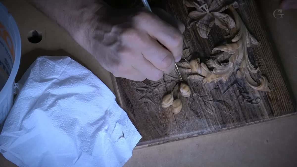 Artist brush working tint around the olives