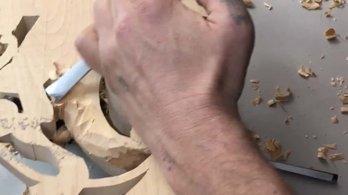 A cut being taken on wood that has no approach at all from the other face