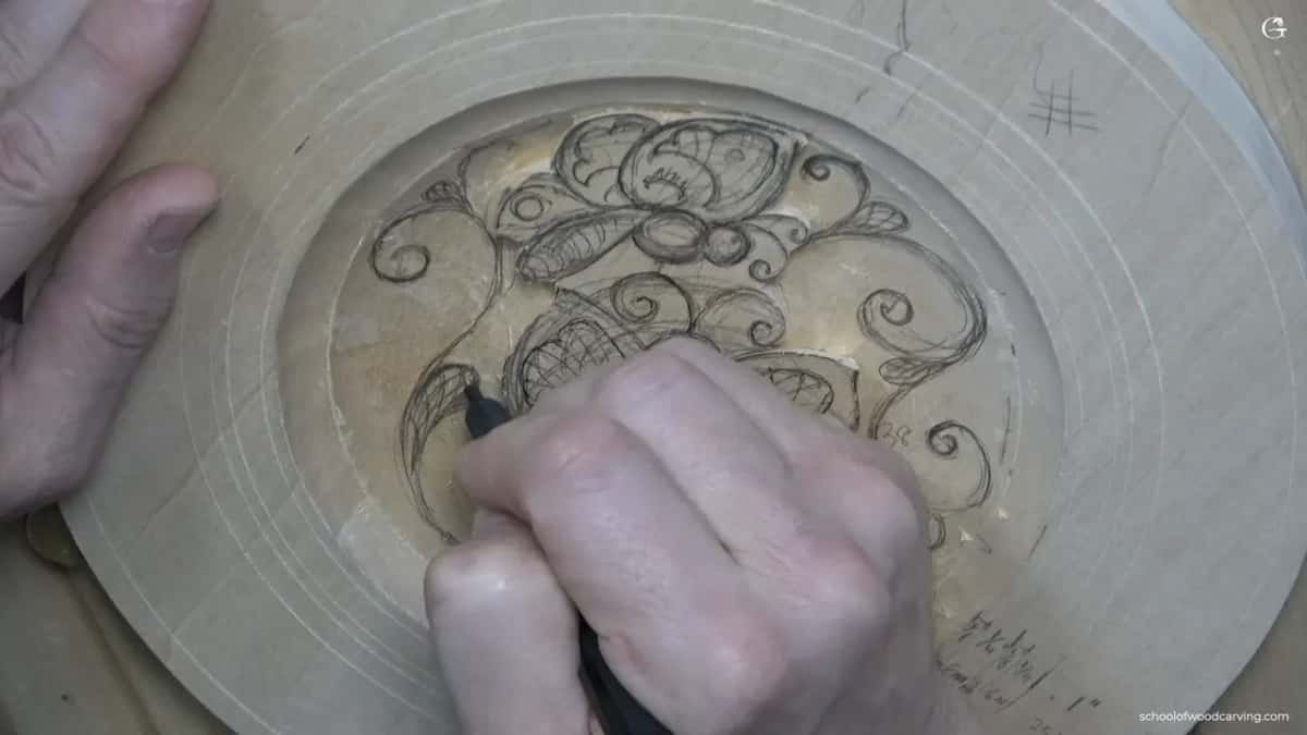 Hash mark on the rim at top right, the hand drawing low on the left