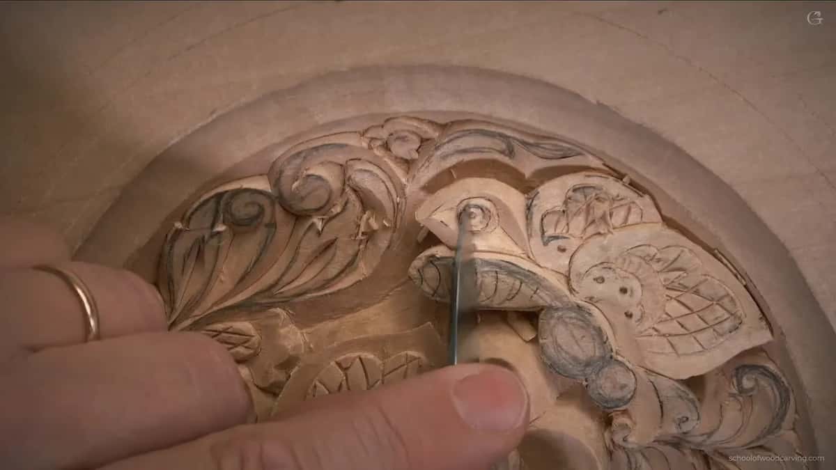 On one wing, a tiny tool sits inside the small circle, with pencil marks all around