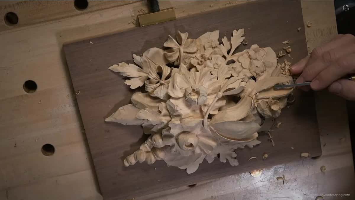 The whole panel from above, one hand in at the upper right