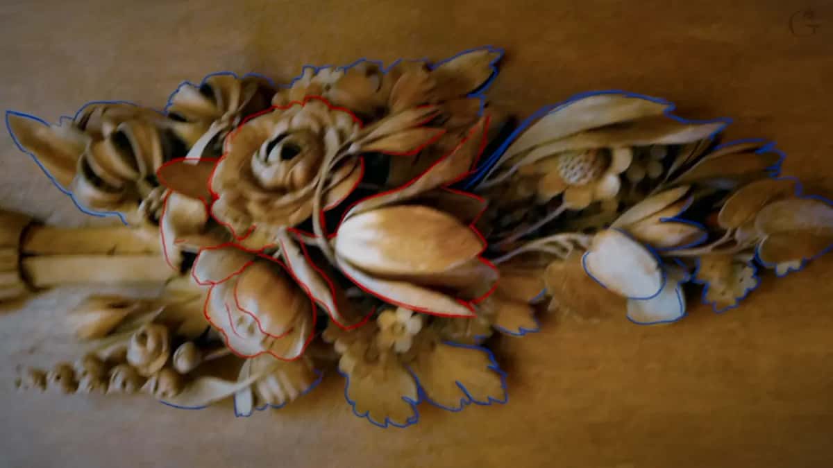 Photograph of the original Gibbons panel with every flower outlined, red for the upper layer and blue for the lower
