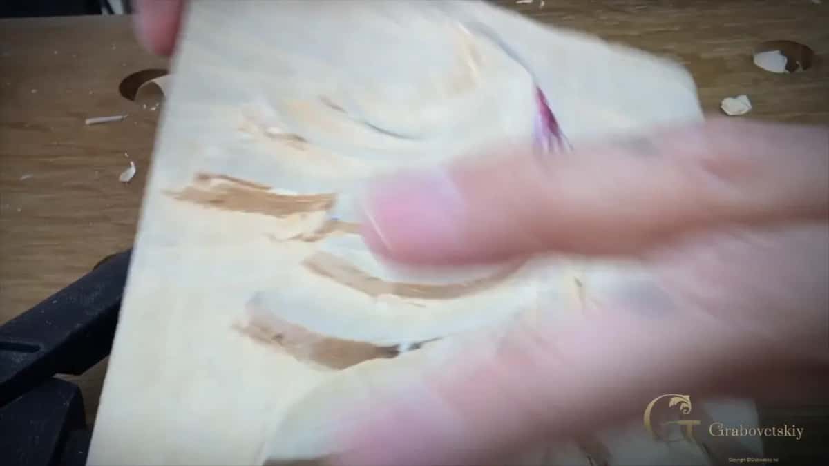 Fingers tracing a finished hollow.