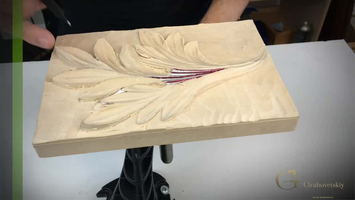 Panel on its turntable, leaf shaped, background still high.