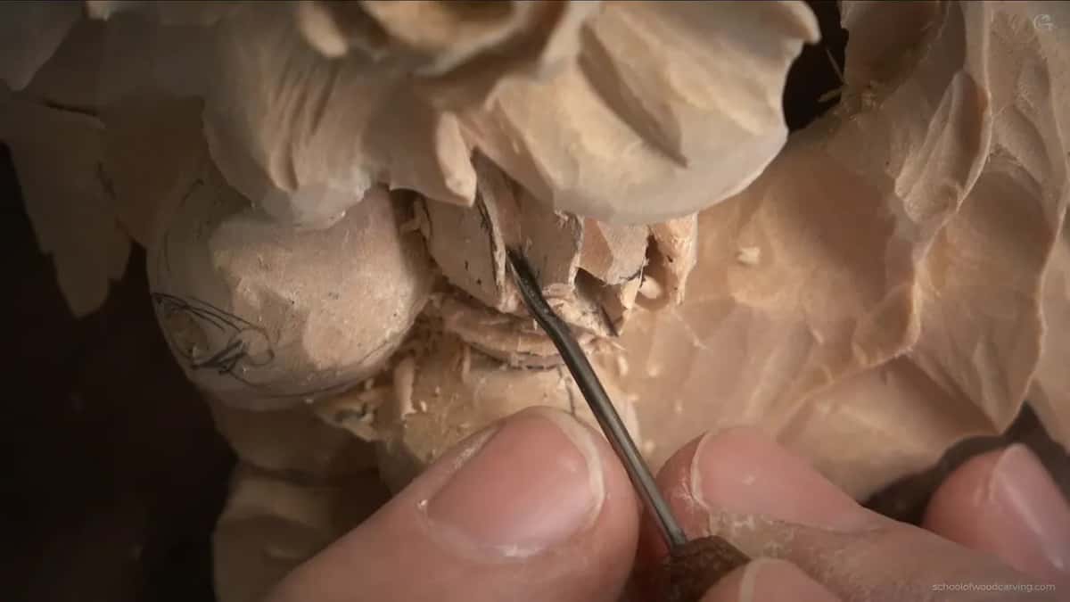 Needle thin micro gouge sliding in under a petal edge