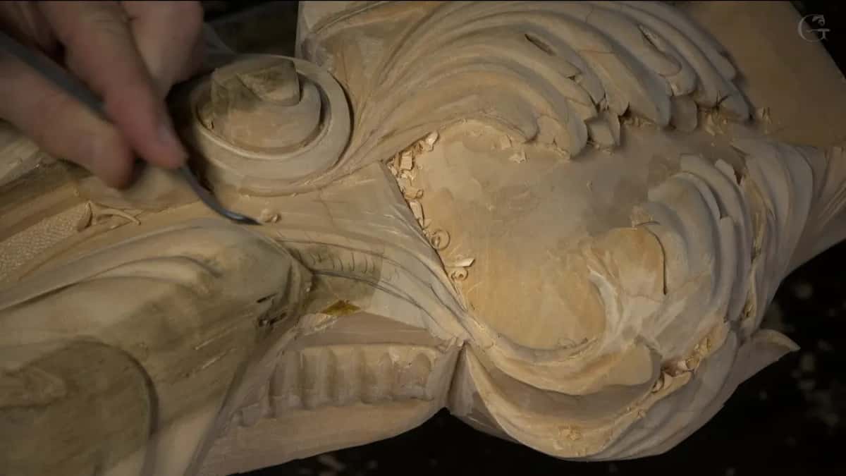 Seen from the side, a blade slides in under the rim.