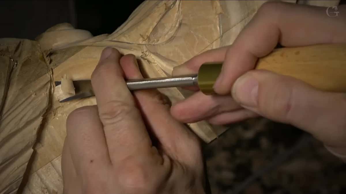 Close up, a small gouge with a brass ferrule.
