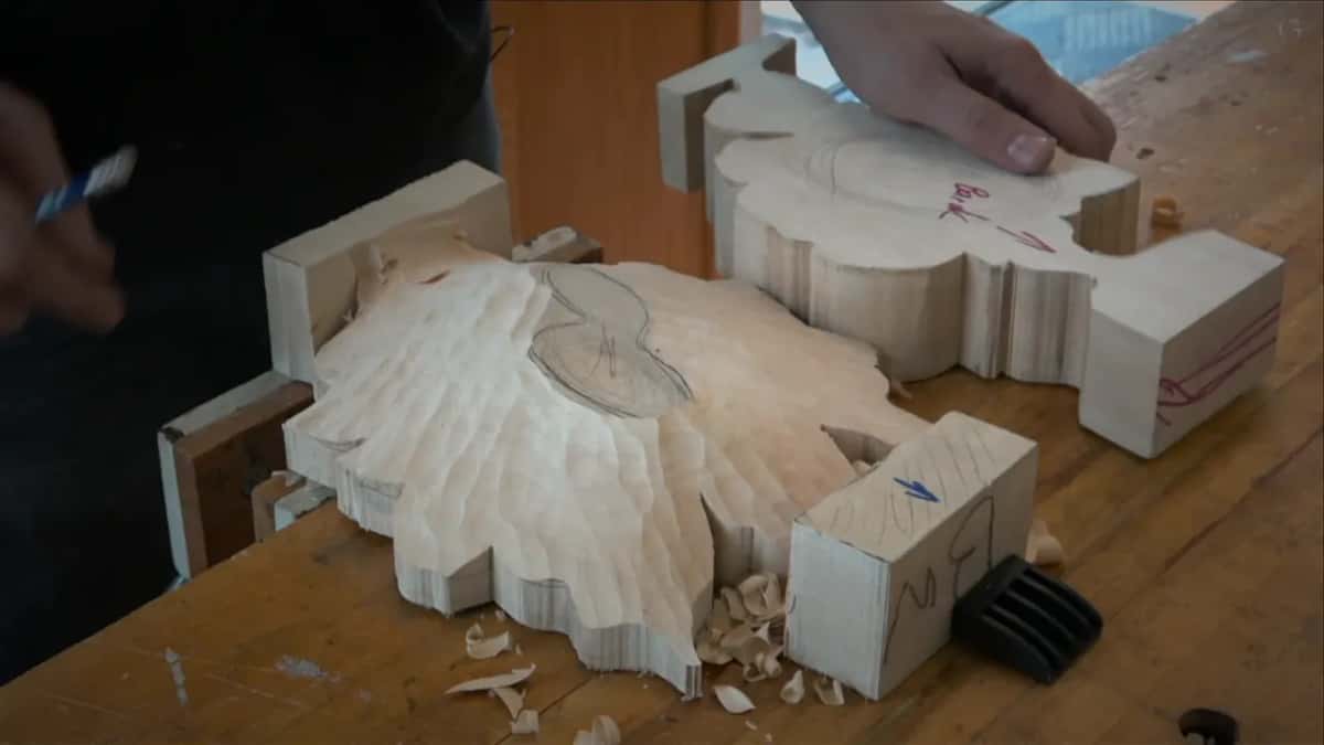 Both blanks on the bench, one domed and faceted, the other flat with Back written across it