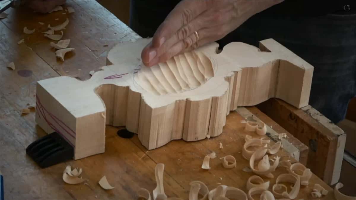 Hollow cut into the back of the upper blank