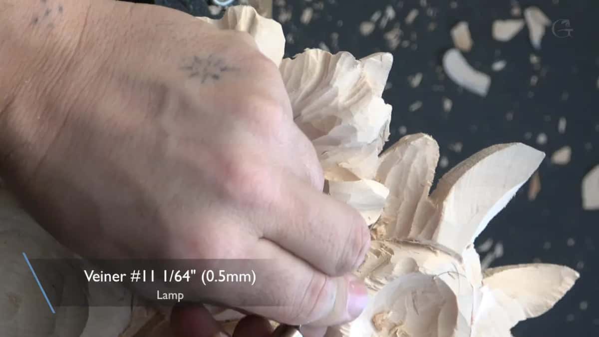 Caption naming the veiner and its maker