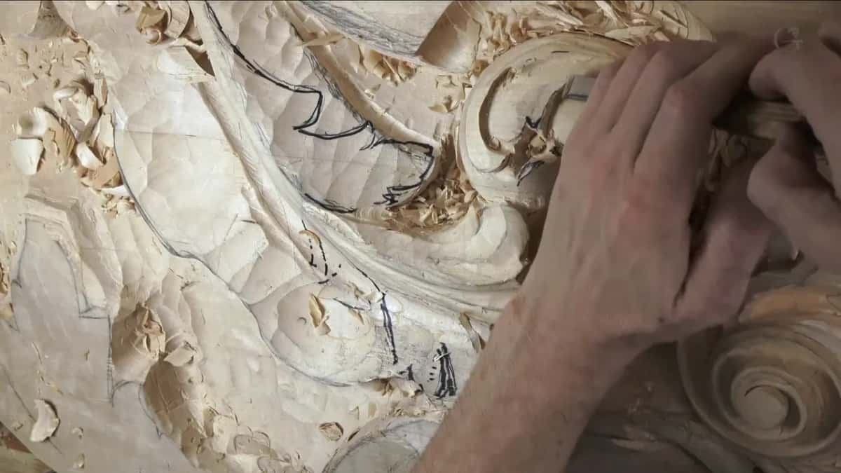 Two hands on one handle.