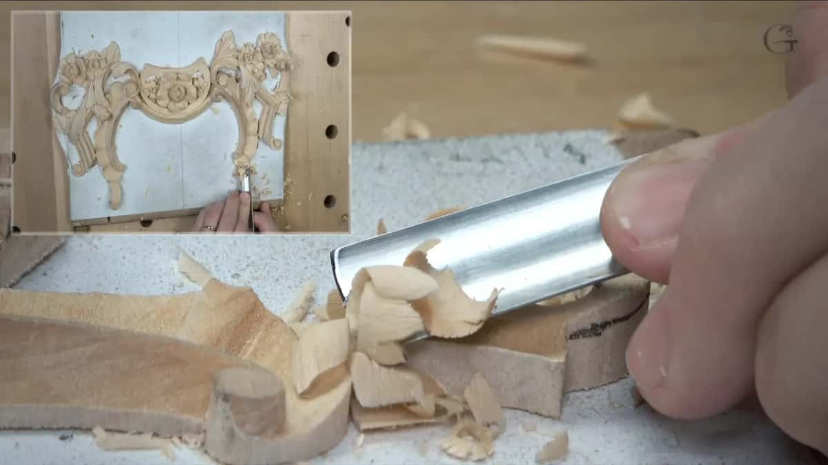 Wide gouge lifting a shaving off the side