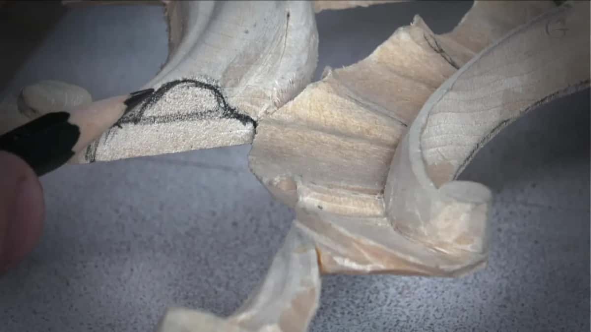 Extra wood left standing at the edge, roughly a millimetre of it