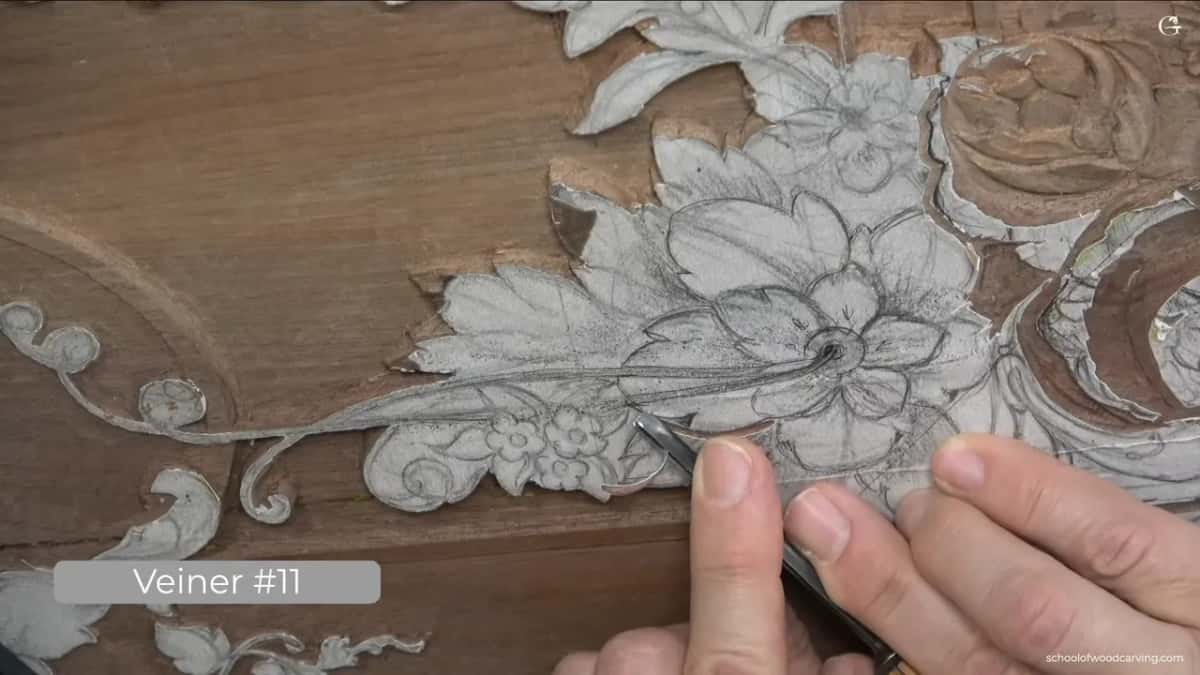 Steady hands guide a veiner along the outline.