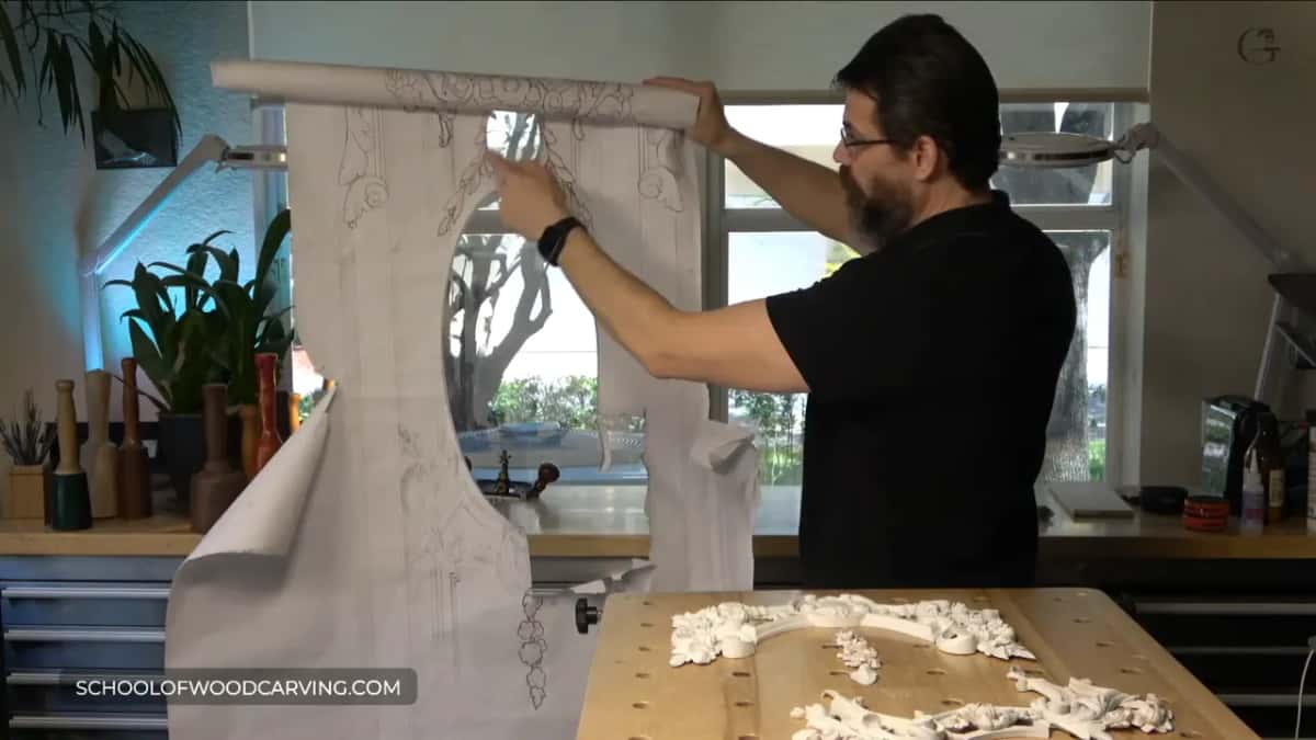 Drawing with holes cut out where the carvings sit