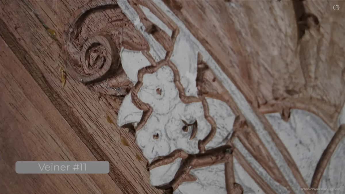 A ring of veiner cuts drawn round the raised middle of a flower before any rounding has been done to it.