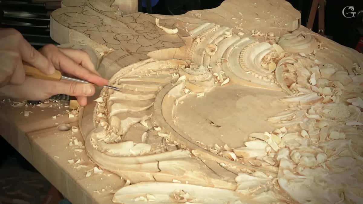 Gouge in hand at the end of the fluted shell