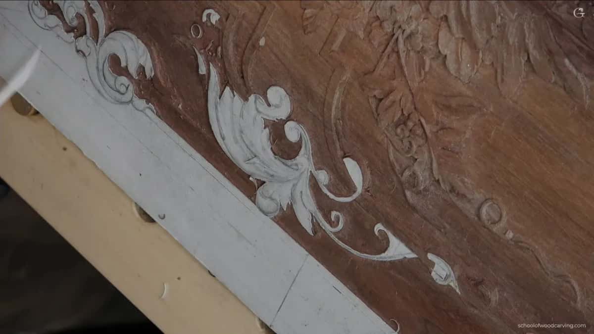 A blade at the top left with pattern paper still glued to one high spot further down the scroll.