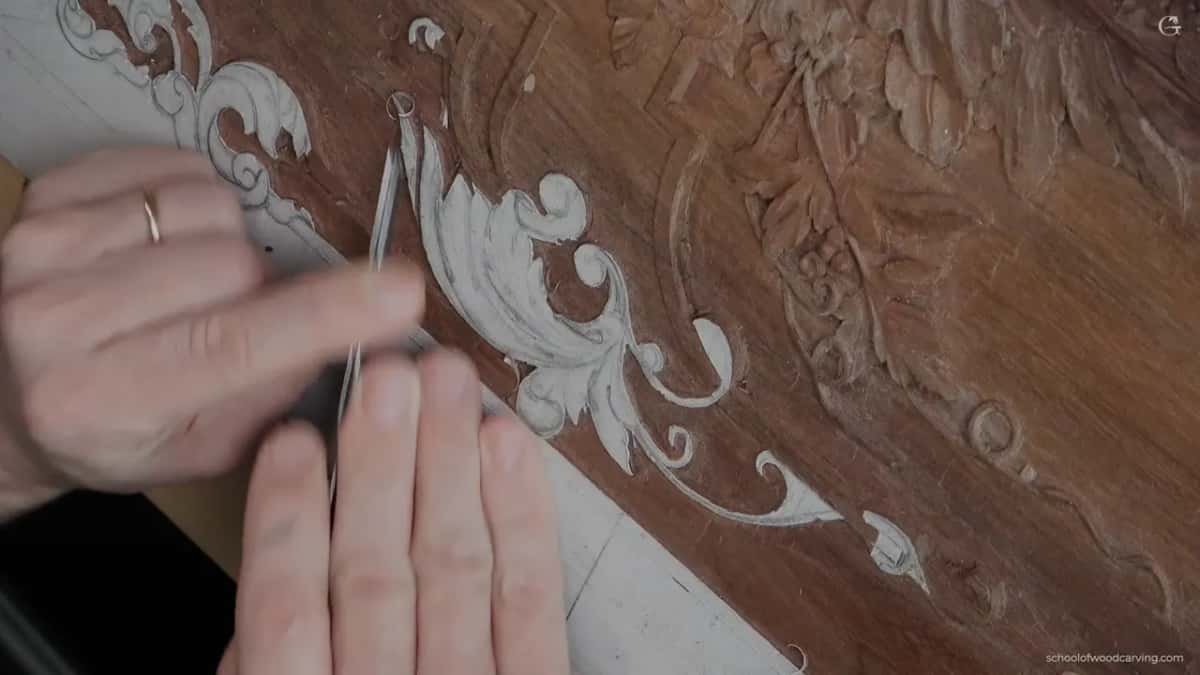 An open palm and a fine tool at the shape he decided to keep without ever understanding it.