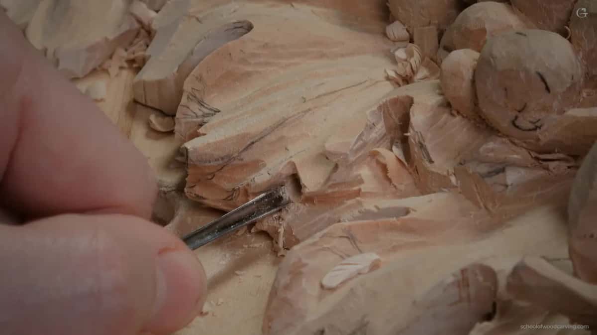 One finger braced, tiny gouge in a narrow hollow