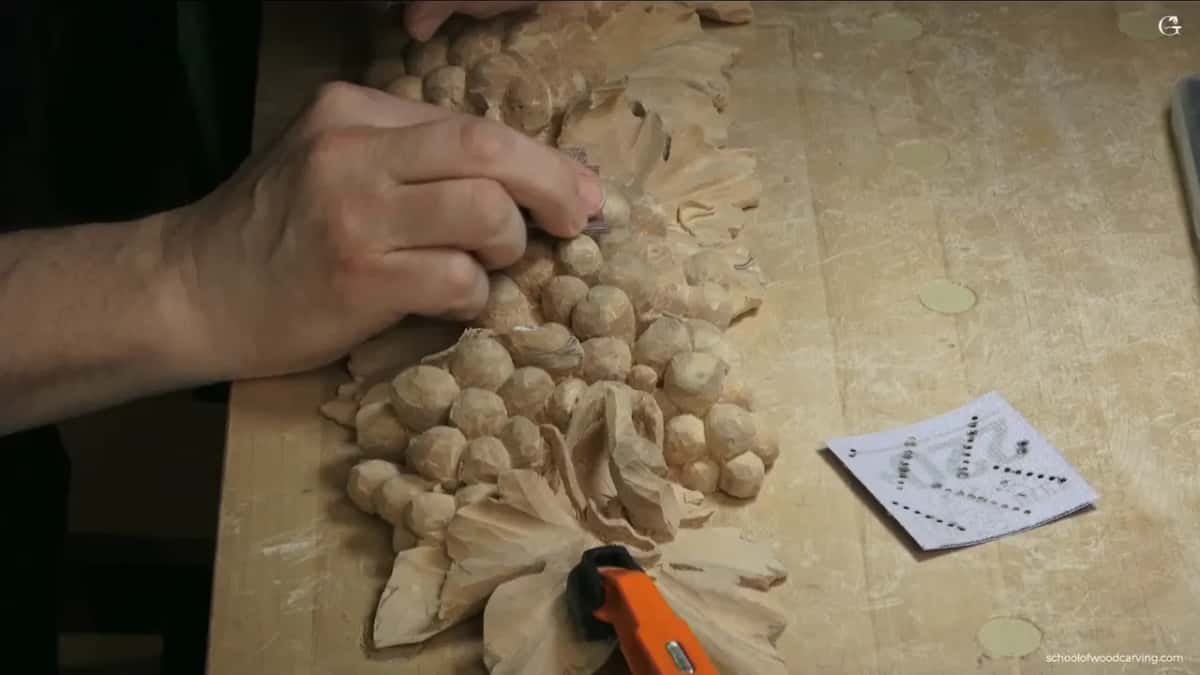 Top of each grape getting a light pass by hand
