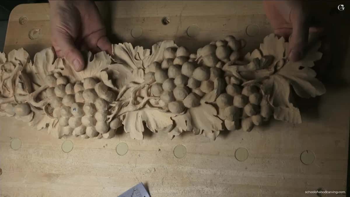 Both hands on the top edge of the onlay