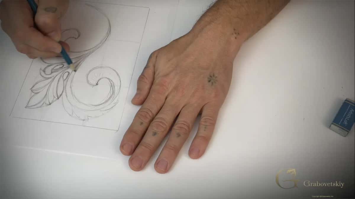 Pencil at the left, hand flat