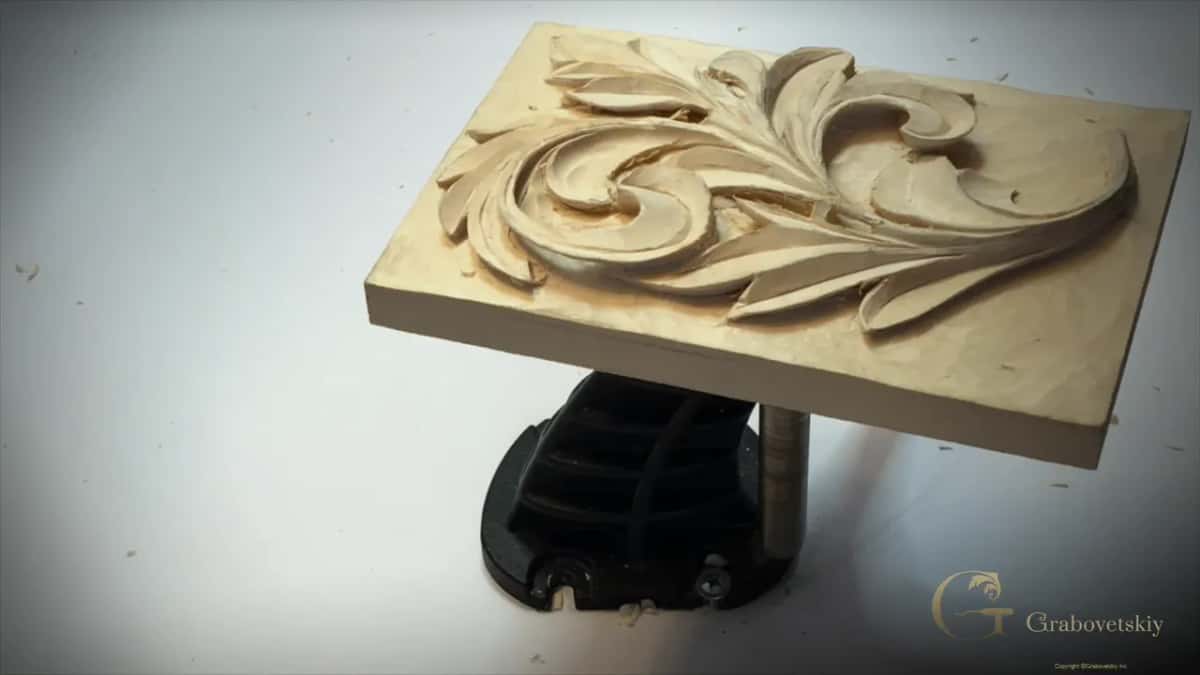 Panel alone on its stand, no hands in the frame, a few chips on the white bench