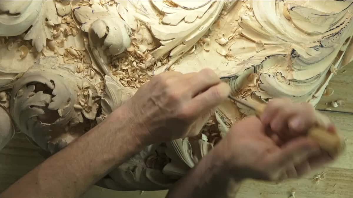Seen from overhead, a pale handle in the right hand.