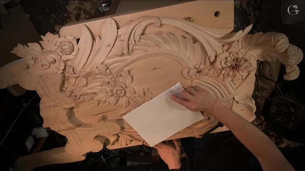 Paper drawing of the profile held over the work