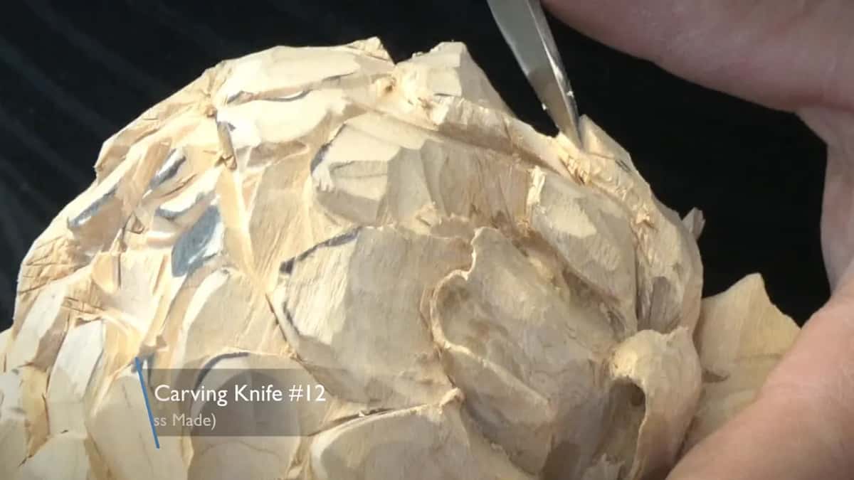On screen the card names a number twelve carving knife, blade up near the top.