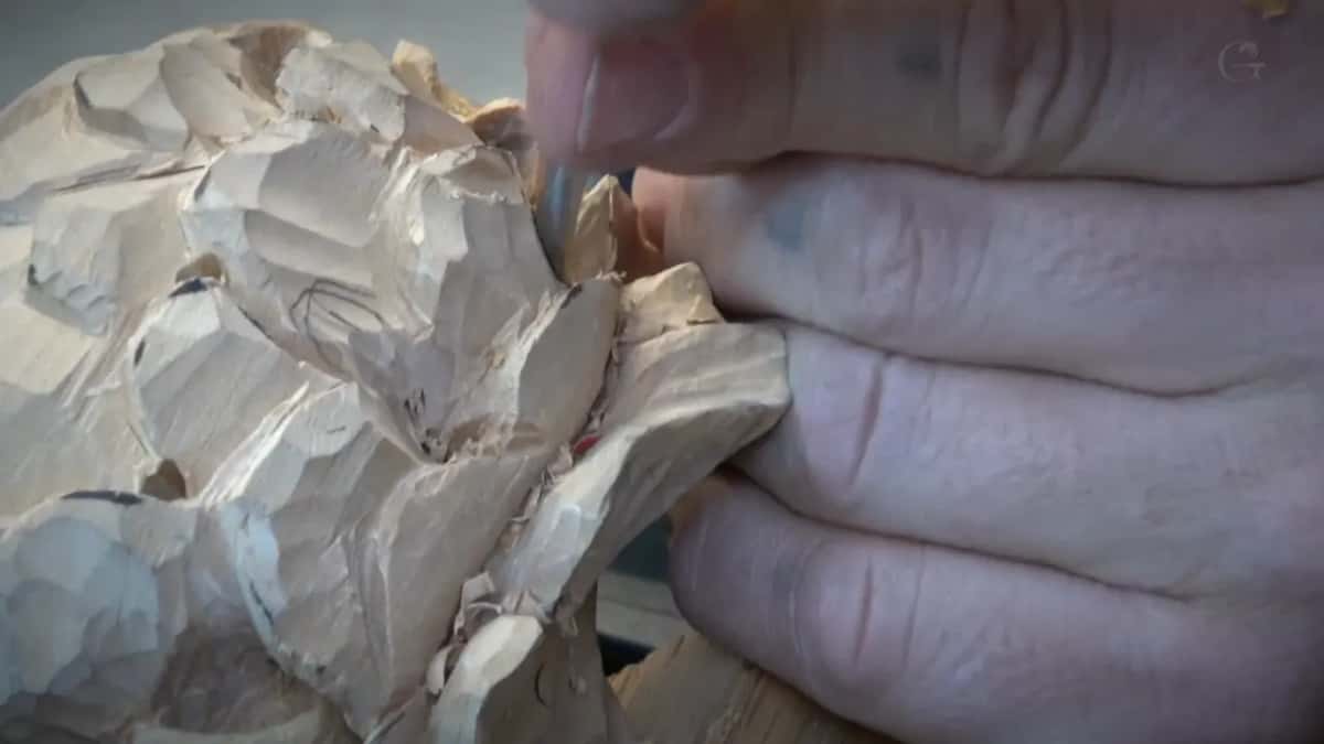 Tool above, the hand braced under it.