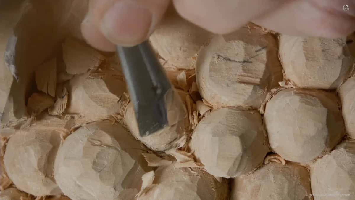 Wider gouge slicing facets off the fruit, taking almost no material at each pass