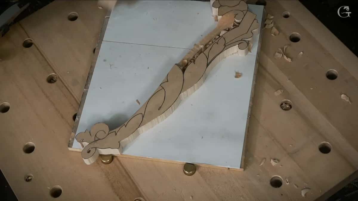 The sawn offcut set beside the blank so the plane sole rides on both.