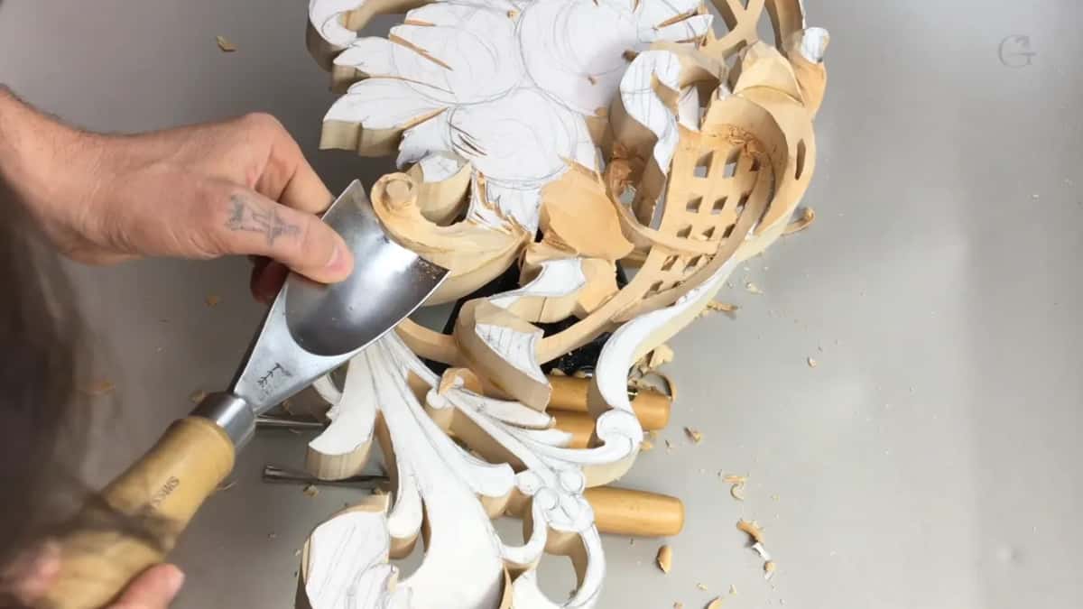 A wide blade laying in the movement, low and rough, before anything is shaped