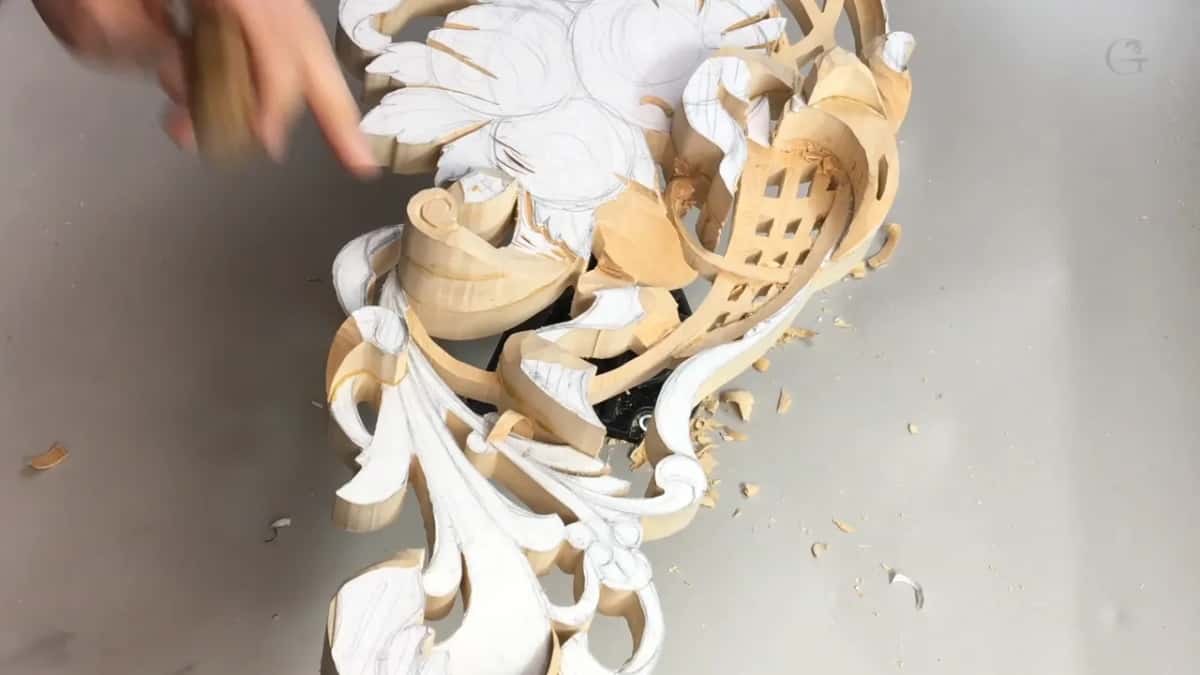 Paper coming off the wood now that a groove has freed its edge all the way round