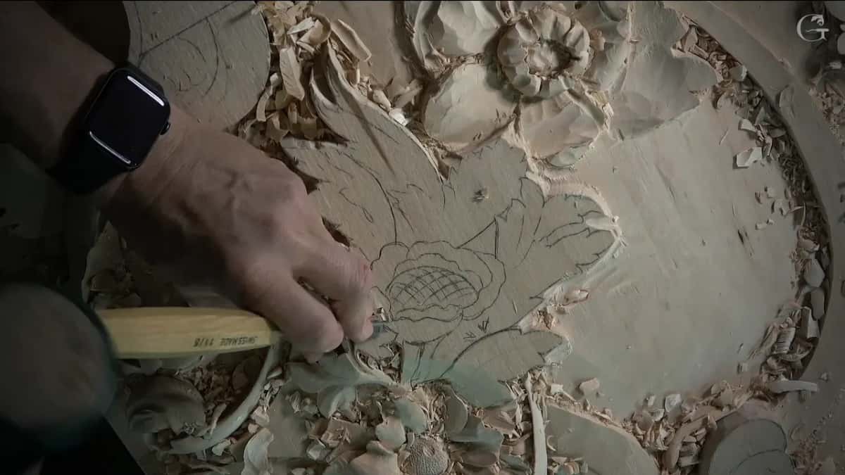 Mallet and gouge at a pencil leaf