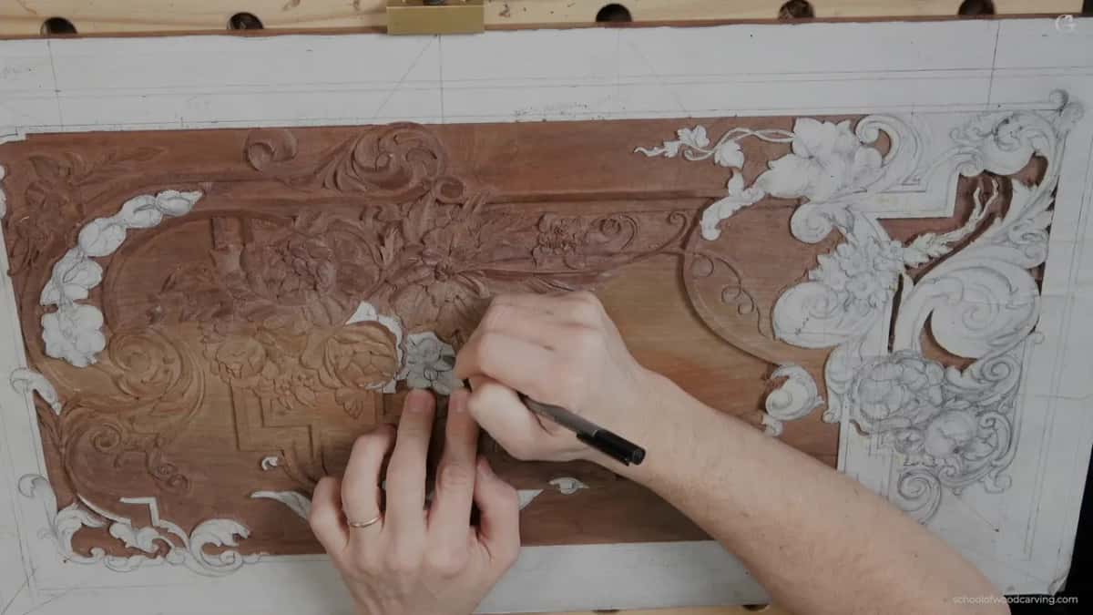 A pencil back on the wood, putting a shape in again where the shavings took it away.