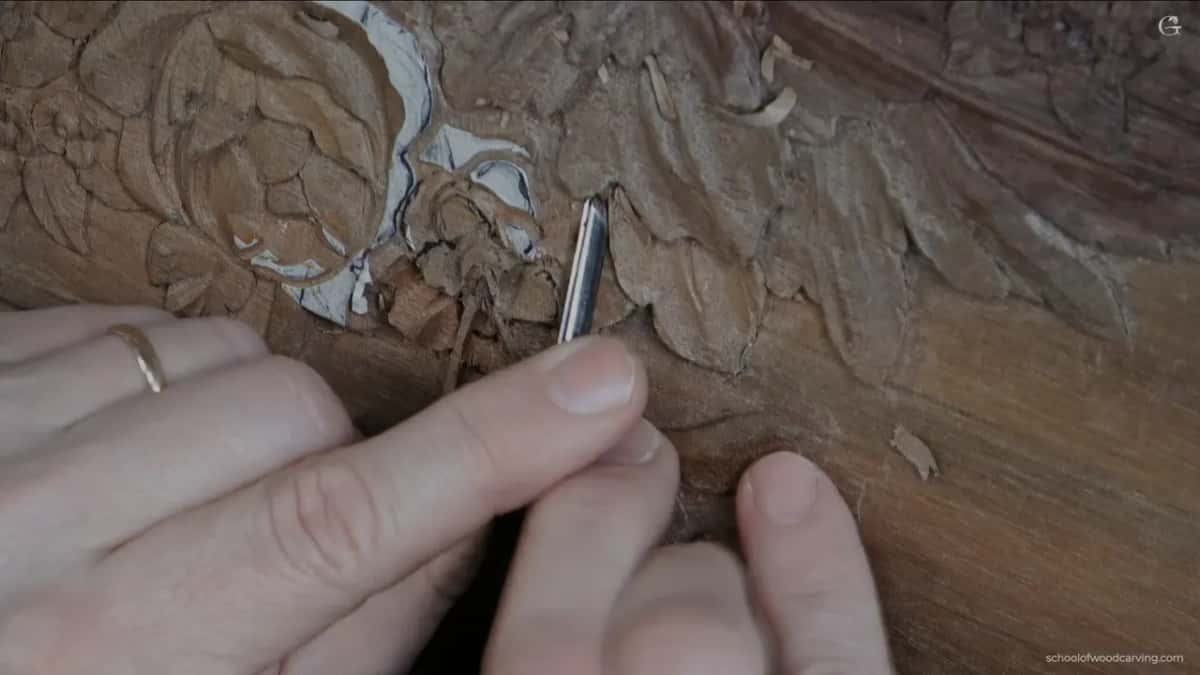 Reaching under an edge with something very small.