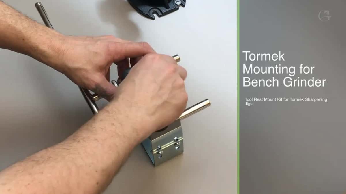 The part he bought, with its own caption on screen reading Tormek Mounting for Bench Grinder, Tool Rest Mount Kit.