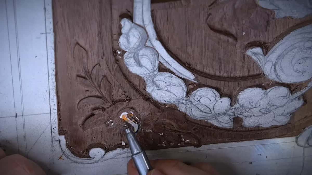 Silver tool against paper