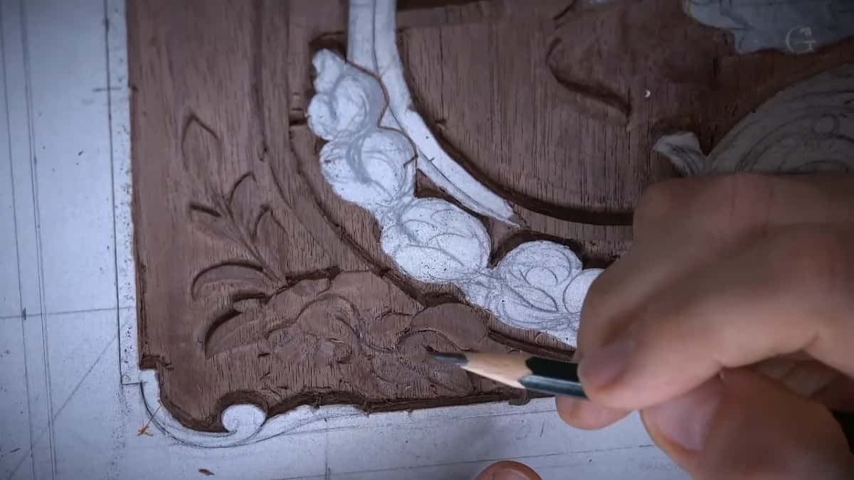 Pencil in hand above the corner