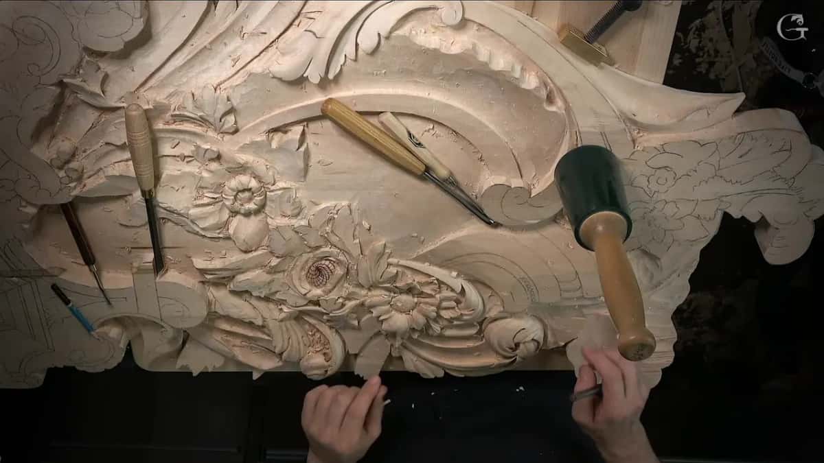 Tools laid across the carving